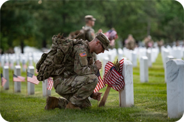 Veteran hugging his dog.